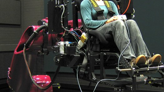 Watch a Giant Robot Arm Simulate a Ferrari Test Drive